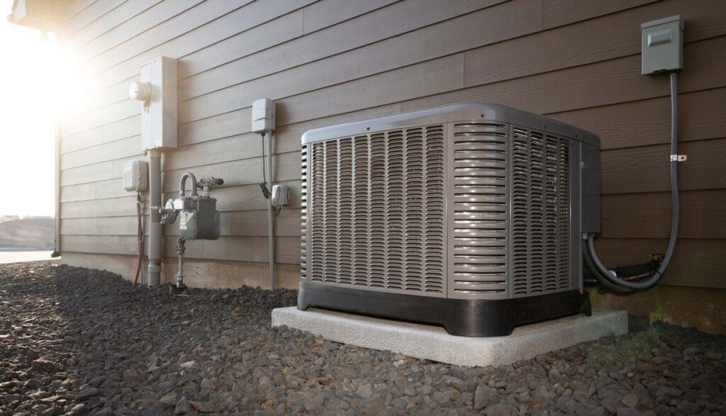 Outdoor air conditioning unit next to a house